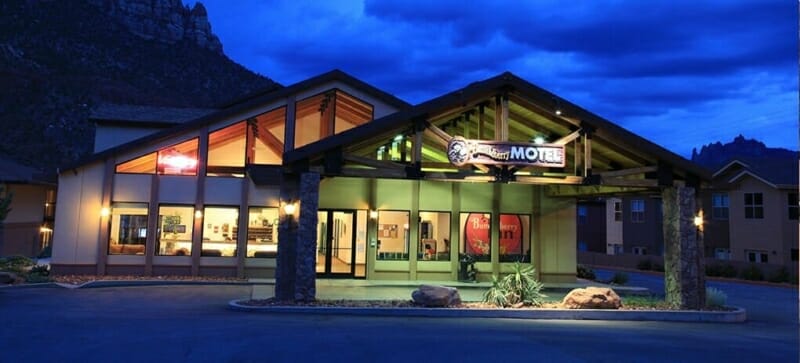 Cozy accommodations at Bumbleberry Inn in Springdale, Utah, near Zion National Park with a beautiful mountain backdrop.