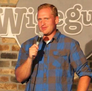 Comedian Andy Gold performing at Bumbleberry Theater in Springdale, Utah, promoting upcoming comedy event.